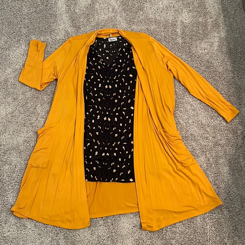 Dark green oversized top with black and gold cheetah print